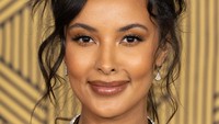 Detail make up dan gaya rambut sanggul yang sedikit messy membuat penampilannya kian menawan. Jeff Spicer/Getty Images/Jeff Spicer