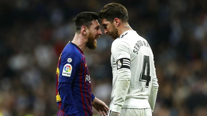 FILE - In this March 2, 2019 file photo, Barcelona forward Lionel Messi, left, goes head to head with Real defender Sergio Ramos as they argue during the Spanish La Liga soccer match between Real Madrid and FC Barcelona at the Bernabeu stadium in Madrid. The Spanish football league on Wednesday Oct. 16. 2019, has asked the Spanish football federation to change the location of the match between Barcelona and Real Madrid to avoid it coinciding with plans for a separatist rally. The league wants the federation to shift the match to Madrid. (AP Photo/Manu Fernandez, File)