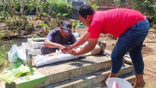 tpu banyuwangi diterjang banjir hingga makam dan jenazah hanyut