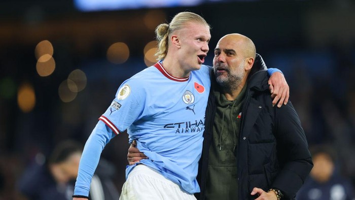 MANCHESTER, ENGLAND - NOVEMBER 05: Erling Haaland of Manchester City celebrates with Josep Pep Guardiola, manager of Manchester City, after the Premier League match between Manchester City and Fulham FC at Etihad Stadium on November 05, 2022 in Manchester, England. (Photo by James Gill - Danehouse/Getty Images)