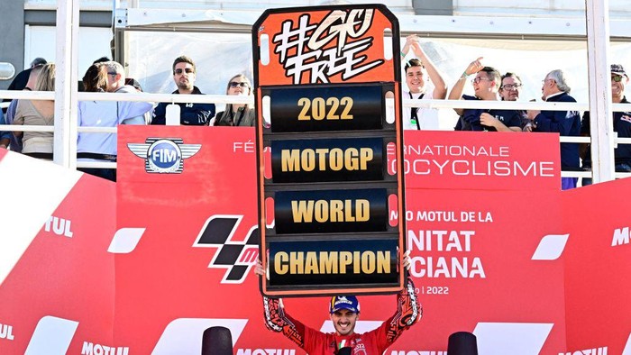 Ducati Italian rider Francesco Bagnaia celebrates as he won the World Championships title after the Valencia MotoGP Grand Prix race at the Ricardo Tormo racetrack in Cheste, near Valencia, on November 6, 2022. (Photo by JAVIER SORIANO / AFP) (Photo by JAVIER SORIANO/AFP via Getty Images)