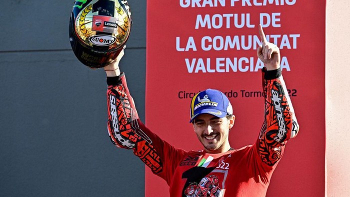 Ducati Italian rider Francesco Bagnaia celebrates as he won the World Championship's title after the Valencia MotoGP Grand Prix race at the Ricardo Tormo racetrack in Cheste, near Valencia, on November 6, 2022. (Photo by JAVIER SORIANO / AFP) (Photo by JAVIER SORIANO/AFP via Getty Images)