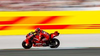 Bagnaia pun mengunci posisi teratas klasemen MotoGP 2022 dengan raihan 265 poin. Eric Alonso/Getty Images