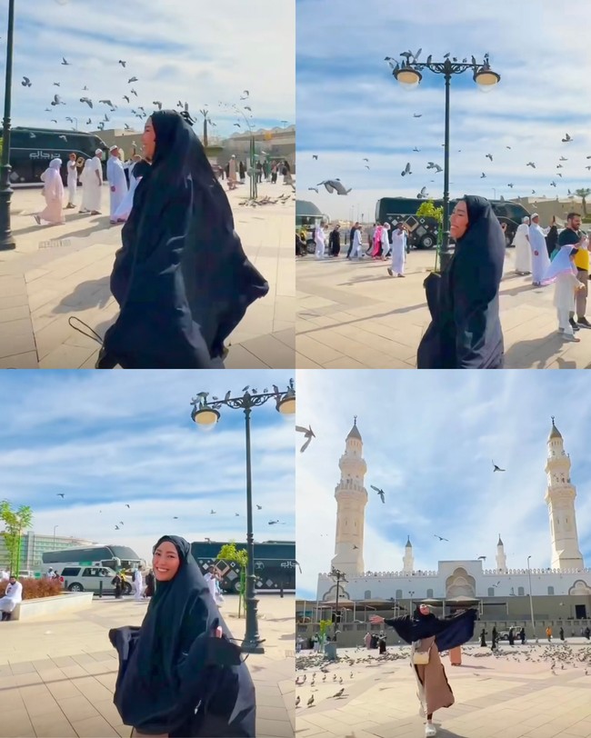 Ayu Dewi menikmati momen ketika berada di Masjid Quba. Ia berlarian diantara burung-burung merpati. Ayu tak berhenti mengucap rasa syukur. Alhamdulillah…kembali ke Masjid Quba, sholat di sini..di Masjid yang pertama kali di bangun Baginda RasulAllah SAW ketika Hijrah dari Mekah ke Madinah. Bahagia hati..Masya Allah..#AyuDewi #AyuDewiStory, ungkap Ayu. Ayu memakai khimar hitam dan dress. Foto: Dok. Instagram @mrsayudewi.