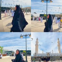 Ayu Dewi menikmati momen ketika berada di Masjid Quba. Ia berlarian diantara burung-burung merpati. Ayu tak berhenti mengucap rasa syukur. Alhamdulillah…kembali ke Masjid Quba, sholat di sini..di Masjid yang pertama kali di bangun Baginda RasulAllah SAW ketika Hijrah dari Mekah ke Madinah. Bahagia hati..Masya Allah..#AyuDewi #AyuDewiStory, ungkap Ayu. Ayu memakai khimar hitam dan dress. Foto: Dok. Instagram @mrsayudewi.