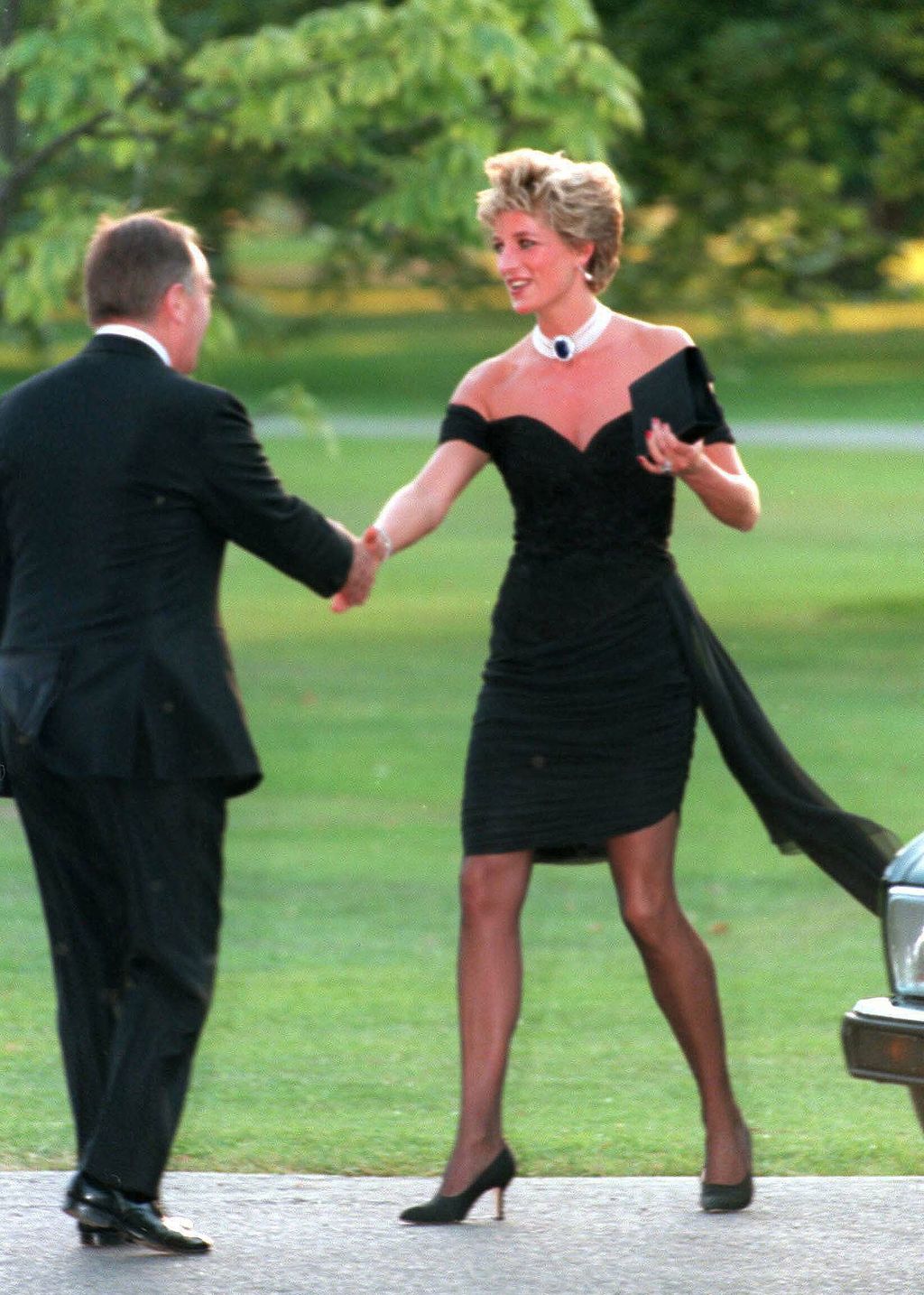 LONDON, UNITED KINGDOM - NOVEMBER 20:  Diana, Princess of Wales, wearing a stunning black dress commissioned from Christina Stambolian, attends the Vanity Fair party at the Serpentine Gallery on November 20, 1994 in London, England.  The famous black 