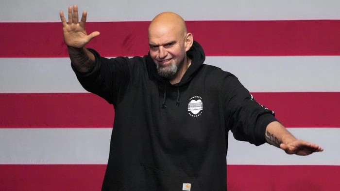 Pennsylvania Lt. Gov. John Fetterman, Democratic candidate for U.S. Senate from Pennsylvania, waves to supporters after addressing an election night party in Pittsburgh, Wednesday, Nov. 9, 2022. (AP Photo/Gene J. Puskar)