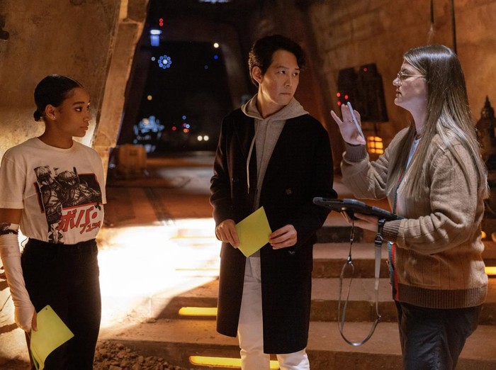 (L-R): Amandla Stenberg, Lee Jung-jae and Director Leslye Headland on the set of Lucasfilms THE ACOLYTE, exclusively on Disney+. ©2022 Lucasfilm Ltd. & TM. All Rights Reserved.