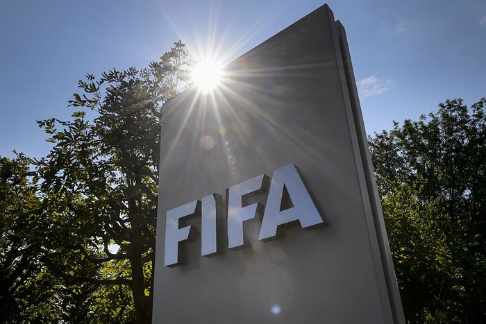 A sign of the FIFA is seen at the entrance of the footballs world body on July 20, 2015 in Zurich. FIFA leaders met July 20 to decide a date for an election to replace president Sepp Blatter and reform steps as footballs world body confronts its biggest corruption crisis. AFP PHOTO / FABRICE COFFRINI (Photo credit should read FABRICE COFFRINI/AFP via Getty Images)