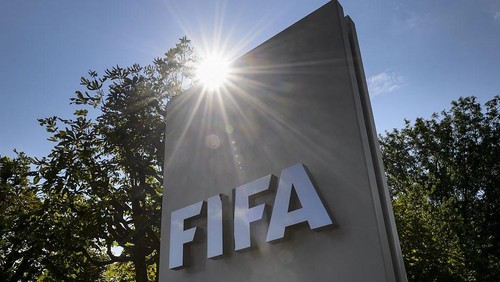 A sign of the FIFA is seen at the entrance of the footballs world body on July 20, 2015 in Zurich. FIFA leaders met July 20 to decide a date for an election to replace president Sepp Blatter and reform steps as footballs world body confronts its biggest corruption crisis.  AFP PHOTO / FABRICE COFFRINI        (Photo credit should read FABRICE COFFRINI/AFP via Getty Images)