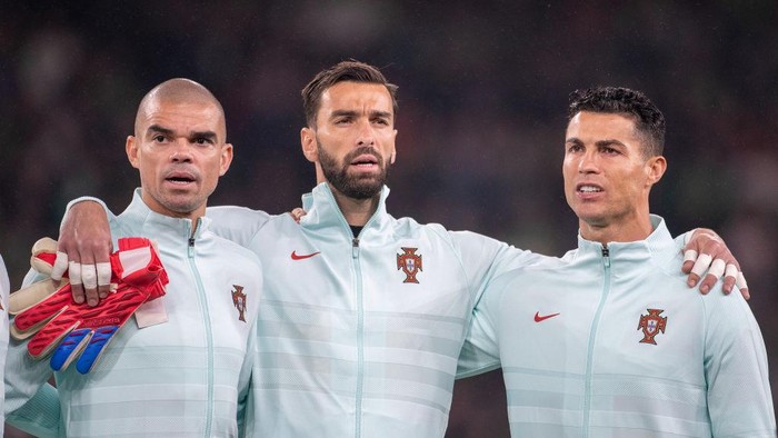 DUBLIN, IRELAND:  November 11: Pepe #3 of Portugal, Rui Patrício #1 of Portugal and Cristiano Ronaldo #7 of Portugal during team national anthems before the Republic of Ireland V Portugal FiFA World Cup qualifying match at Aviva Stadium on November 11th, 2021 in Dublin, Ireland. (Photo by Tim Clayton/Corbis via Getty Images)
