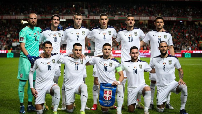 Serbias team players celebrate the victory at the end the FIFA World Cup Qatar 2022  qualification group A football match between Portugal and Serbia at the Luz stadium in Lisbon, Portugal, on November 14, 2021. (Photo by Pedro Fiúza/NurPhoto via Getty Images)