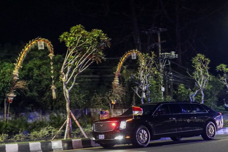 Cars transporting U.S. President Joe Biden's convoy drives along a road after Biden arrived at Ngurah Rai International Airport ahead of the G20 Summit in Nusa Dua, Bali, Indonesia, Sunday, Nov. 13, 2022. Indonesia will host the 17th G20 Summit in Nusa Dua, Bali, Nov. 15-16. The heads of state from 19 countries and the European Union (EU) are scheduled to attend the summit. Other related events will occur from Nov. 10. Around 6,500 delegates are also expected to participate in the summit. The main meeting will take place at Apurva Kempinski, while other event venues include Garuda Wisnu Kencana (GWK) Cultural Park in South Kuta, Ngurah Rai Mangrove Forest in Denpasar, and Hotel Sofitel Bali Nusa Dua. (Photo by Garry Lotulung/NurPhoto via Getty Images)