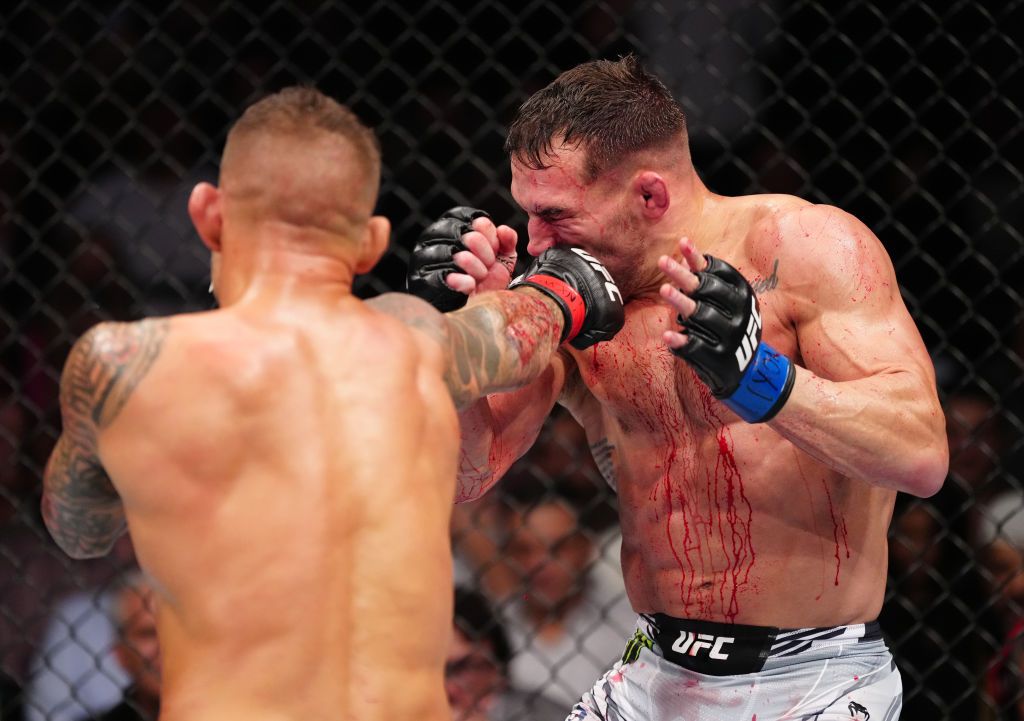 NEW YORK, NEW YORK - NOVEMBER 12: (L-R) Dustin Poirier punches Michael Chandler in a lightweight bout during the UFC 281 event at Madison Square Garden on November 12, 2022 in New York City. (Photo by Jeff Bottari/Zuffa LLC)