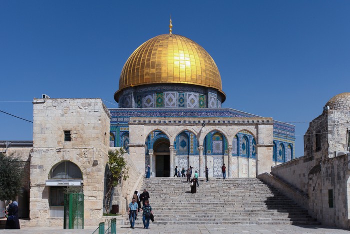 Arched South gateway with Siliver dome of Al-Aqsa Mosque at the square of Golden Dome of the Rock, in an Islamic shrine located on the Temple Mount in the Old City Jerusalem, Israel