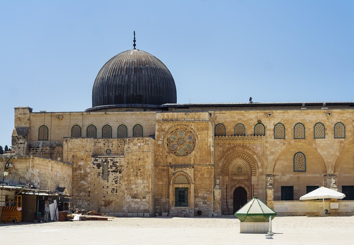 Arched South gateway with Siliver dome of Al-Aqsa Mosque at the square of Golden Dome of the Rock, in an Islamic shrine located on the Temple Mount in the Old City Jerusalem, Israel