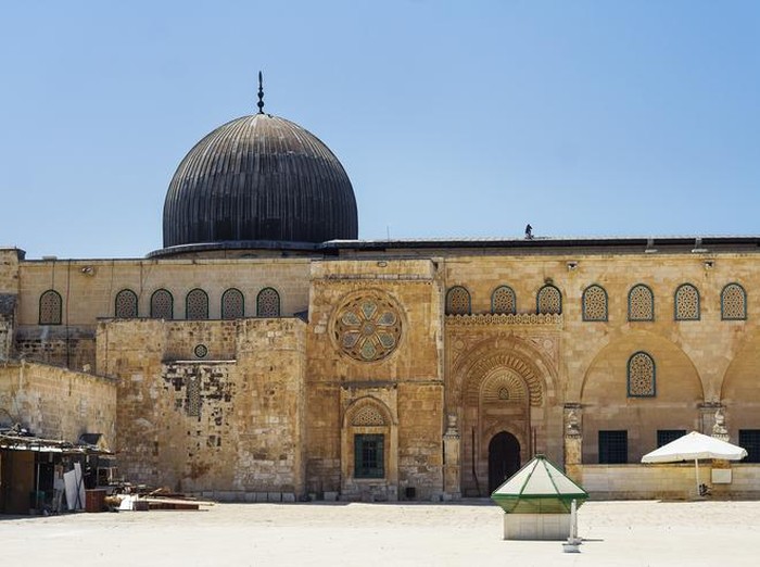 Arched South gateway with Siliver dome of Al-Aqsa Mosque at the square of Golden Dome of the Rock, in an Islamic shrine located on the Temple Mount in the Old City Jerusalem, Israel