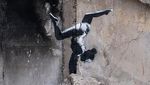 Ironis! Mural Banksy Muncul di Ukraina