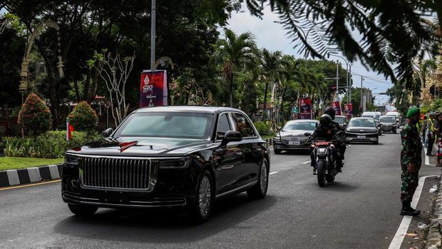 Cars transporting China's President Xi Jinping convoy drives along a road after Jinping arrived at Ngurah Rai International Airport ahead of the G20 Summit in Bali, Indonesia, Monday, Nov. 14, 2022. Chinese leader Xi Jinping and U.S. President Joe Biden met on Monday for long-awaited talks that come as relations between their countries are at their lowest in decades, marred by disagreements over a host of issues from Taiwan to trade. The two, holding their first in-person talks since Biden became president, met on the Indonesian island of Bali ahead of a Group of 20 (G20) summit on Tuesday that is set to be fraught with tension over Russia's invasion of Ukraine. (Photo by Garry Lotulung/NurPhoto via Getty Images)