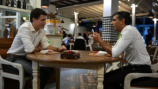 Canada's Prime Minister Justin Trudeau and British Prime Minister Rishi Sunak have a bilateral meeting at the Art Cafe Bumbu Bali, ahead of the G20 Summit, in Nusa Dua, Bali, Indonesia, November 14, 2022.  Leon Neal/Pool via REUTERS