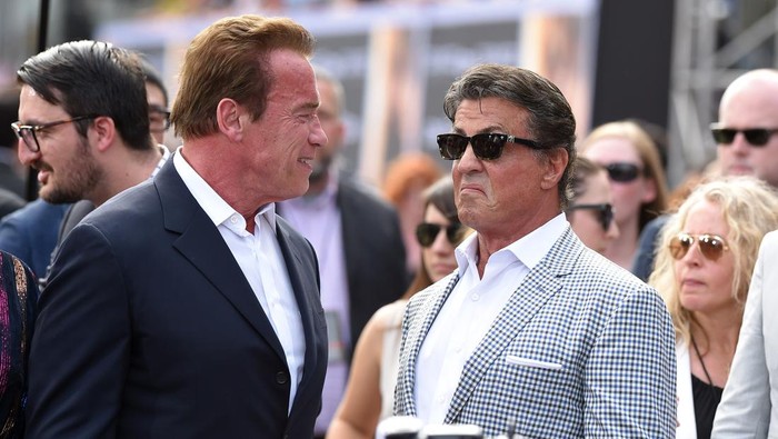 HOLLYWOOD, CA - JUNE 28:  Actors Arnold Schwarzenegger and Sylvester Stallone arrive at the Los Angeles premiere of Terminator Genisys at Dolby Theatre on June 28, 2015 in Hollywood, California.  (Photo by Axelle/Bauer-Griffin/FilmMagic)
