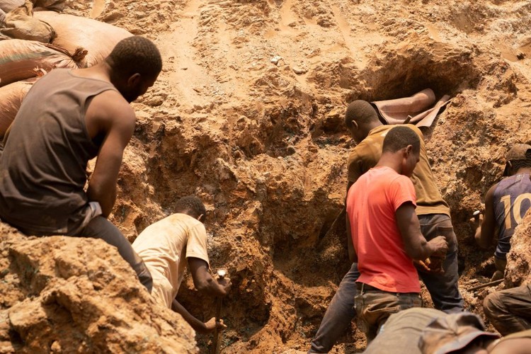 Artisanal miners carry sacks of ore at the Shabara artisanal mine near Kolwezi on October 12, 2022. - Some 20,000 people work at Shabara, in shifts of 5,000 at a time.
Congo produced 72 percent of the worlds cobalt last year, according to Darton Commodities. And demand for the metal is exploding due to its use in the rechargeable batteries that power mobile phones and electric cars.
But the countrys poorly regulated artisanal mines, which produce a small but not-negligeable percentage of its total output, have tarnished the image of Congolese cobalt. (Photo by Junior KANNAH / AFP) (Photo by JUNIOR KANNAH/AFP via Getty Images)