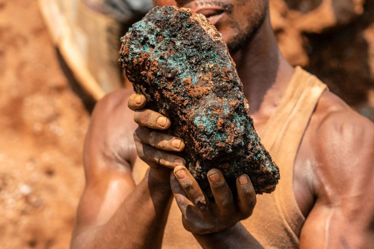 Artisanal miners carry sacks of ore at the Shabara artisanal mine near Kolwezi on October 12, 2022. - Some 20,000 people work at Shabara, in shifts of 5,000 at a time.
Congo produced 72 percent of the worlds cobalt last year, according to Darton Commodities. And demand for the metal is exploding due to its use in the rechargeable batteries that power mobile phones and electric cars.
But the countrys poorly regulated artisanal mines, which produce a small but not-negligeable percentage of its total output, have tarnished the image of Congolese cobalt. (Photo by Junior KANNAH / AFP) (Photo by JUNIOR KANNAH/AFP via Getty Images)