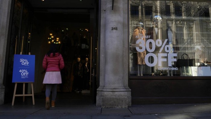 A large department store with a hoarding reading 'Lets Change the Way we Shop' on its exterior on Oxford Street in London, Wednesday, Nov. 16, 2022. Britain's inflation rate rose to a 41-year high in October, fueling demands for the government to do more to ease the nation's cost-of-living crisis when it releases new tax and spending plans on Thursday. The Office for National Statistics says consumer prices rose 11.1% in the 12 months through October, compared with 10.1% in September. The October figure exceeded economists expectations of 10.7%. (AP Photo/Alastair Grant)