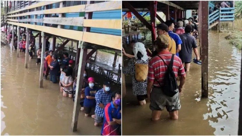 Images circulating on social media of voters queuing in a flooded area in Baram, Sarawak on Nov 19, 2022.