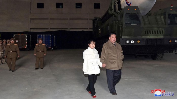 North Korean leader Kim Jong Un, along with his daughter, inspects an intercontinental ballistic missile (ICBM) in this undated photo released on November 19, 2022 by North Koreas Korean Central News Agency (KCNA). KCNA via REUTERS ATTENTION EDITORS - THIS IMAGE WAS PROVIDED BY A THIRD PARTY. NO THIRD PARTY SALES. SOUTH KOREA OUT. NO COMMERCIAL OR EDITORIAL SALES IN SOUTH KOREA. REUTERS IS UNABLE TO INDEPENDENTLY VERIFY THIS IMAGE.