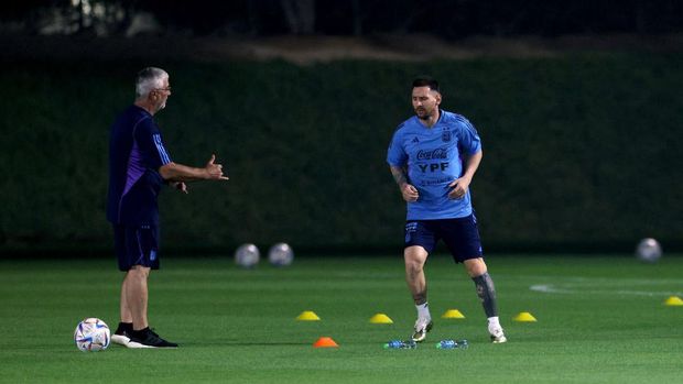 DOHA, QATAR - NOVEMBER 19: Lionel Messi of Argentina trains away from the main squad with the medical adviser during the training session for Team Argentina at Qatar University on November 19, 2022 in Doha, Qatar. (Photo by Dean Mouhtaropoulos/Getty Images)