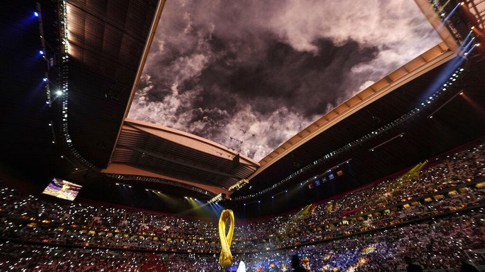 Smoke from fireworks is seen over the stadium at the opening ceremony prior he World Cup, group A soccer match between Qatar and Ecuador at the Al Bayt Stadium in Al Khor, Sunday, Nov. 20, 2022. (AP Photo/Natacha Pisarenko)