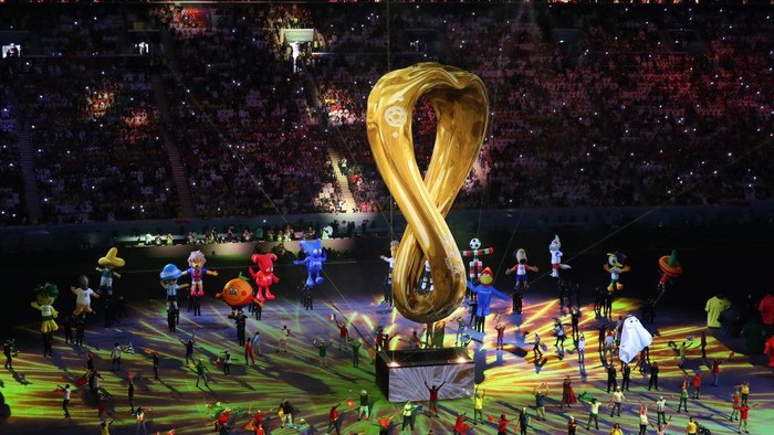 AL KHOR, QATAR - NOVEMBER 20: A general view of the opening ceremony as dancers and a giant Qatar 2022 logo is seen ahead of the FIFA World Cup Qatar 2022 Group A match between Qatar and Ecuador at Al Bayt Stadium on November 20, 2022 in Al Khor, Qatar. (Photo by Robbie Jay Barratt - AMA/Getty Images)