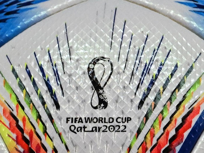 A photo shows the tournament logo on and official ball ahead of a press conference at the Qatar National Convention Centre (QNCC) in Doha on November 20, 2022, ahead of the opening match of the Qatar 2022 World Cup football tournament. (Photo by Alberto PIZZOLI / AFP) (Photo by ALBERTO PIZZOLI/AFP via Getty Images)