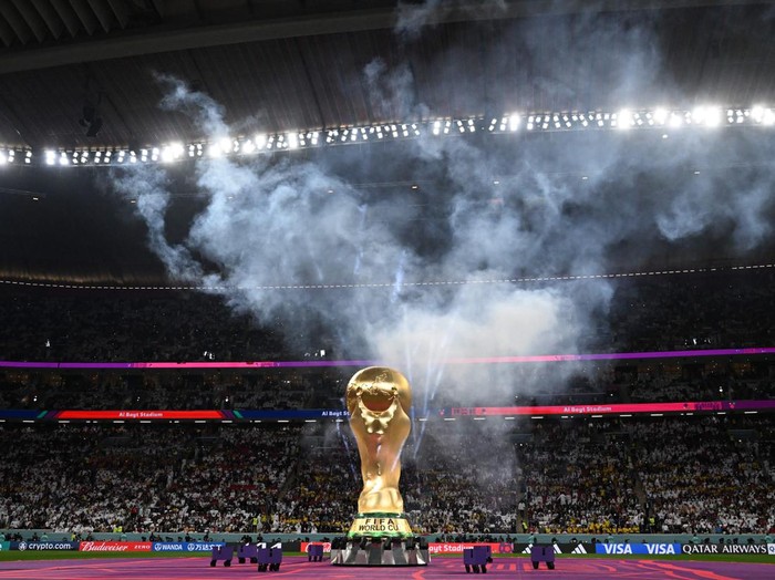 A replica of the FIFA World Cup trophy is pictured on the pitch during the opening ceremony ahead of the Qatar 2022 World Cup Group A football match between Qatar and Ecuador at the Al-Bayt Stadium in Al Khor, north of Doha on November 20, 2022. (Photo by Raul ARBOLEDA / AFP) (Photo by RAUL ARBOLEDA/AFP via Getty Images)