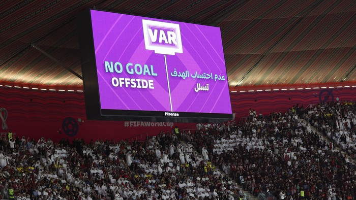 Soccer Football - FIFA World Cup Qatar 2022 - Group A - Qatar v Ecuador - Al Bayt Stadium, Al Khor, Qatar - November 20, 2022
A big screen displays a VAR review message for a disallowed goal REUTERS/Amr Abdallah Dalsh