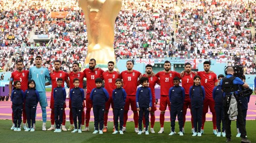 DOHA, QATAR - NOVEMBER 21: Iran players line up for the national anthem prior to the FIFA World Cup Qatar 2022 Group B match between England and IR Iran at Khalifa International Stadium on November 21, 2022 in Doha, Qatar. (Photo by Julian Finney/Getty Images)