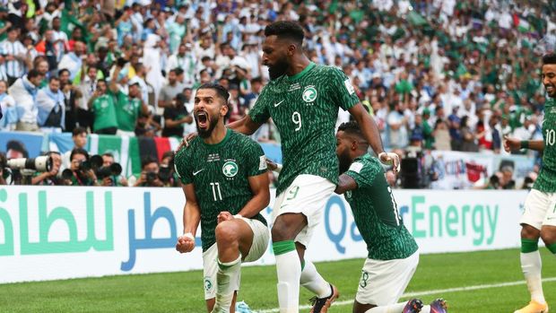 LUSAIL CITY, QATAR - NOVEMBER 22: Saleh Al-Shehri of Saudi Arabia celebrates with his team mates after scoring a goal to make it 1-1 during the FIFA World Cup Qatar 2022 Group C match between Argentina and Saudi Arabia at Lusail Stadium on November 22, 2022 in Lusail City, Qatar. (Photo by James Williamson - AMA/Getty Images)