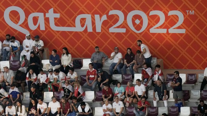 Fans watch during the World Cup group B soccer match between England and Iran at the Khalifa International Stadium in in Doha, Qatar, Monday, Nov. 21, 2022. (AP Photo/Hassan Ammar)