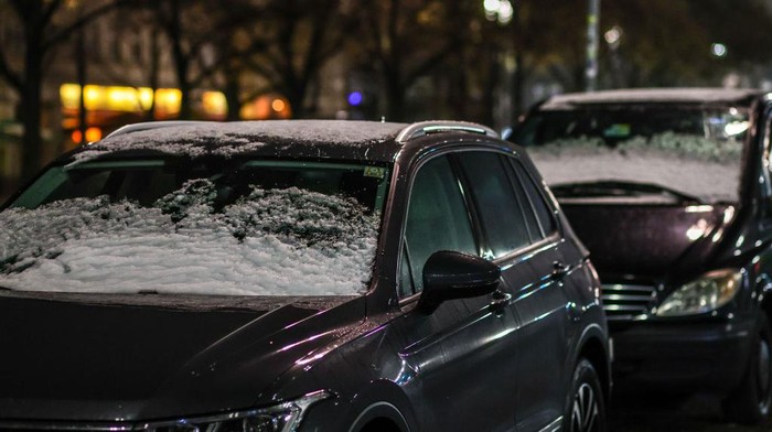 1245001033 BERLIN, GERMANY - NOVEMBER 22: A pile of snow gathered on a pavement with street lights in the background on November 22, 2022 in Berlin, Germany. Winter has arrived in Germany with subzero temperatures as the country continues to face an uncertain energy market due to the consequences of Russia's ongoing war in Ukraine. While natural gas reserves are full and the government has finalized a price cap scheme on electricity and heating costs for consumers, many Germans remain concerned whether they will be able to afford their energy bills and whether energy supplies will be stable over the coming months. (Photo by Omer Messinger/Getty Images)