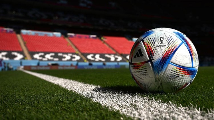 Al Rihla, Bola Canggih Piala Dunia 2022 Buatan Madiun AL KHOR, QATAR - NOVEMBER 23: adidas ‘Al Rihla’ official match ball is seen prior to the FIFA World Cup Qatar 2022 Group F match between Morocco and Croatia at Al Bayt Stadium on November 23, 2022 in Al Khor, Qatar. (Photo by Michael Regan - FIFA/FIFA via Getty Images)