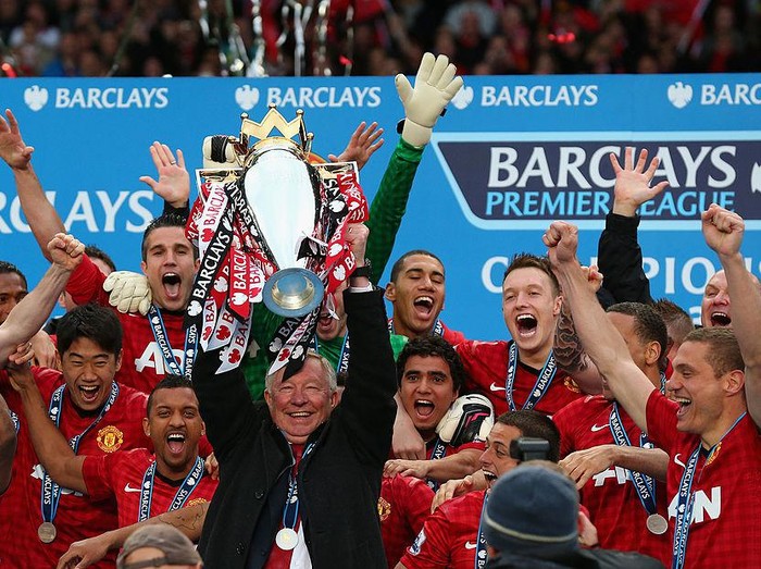 MANCHESTER, ENGLAND - MAY 12: Manchester United Manager Sir Alex Ferguson lifts the Premier League trophy following the Barclays Premier League match between Manchester United and Swansea City at Old Trafford on May 12, 2013 in Manchester, England. (Photo by Alex Livesey/Getty Images)