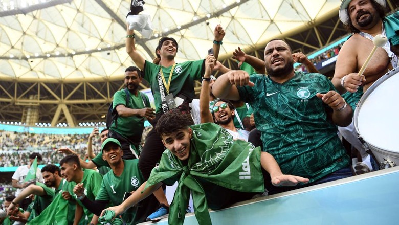 Soccer Football - FIFA World Cup Qatar 2022 - Group C - Argentina v Saudi Arabia - Lusail Stadium, Lusail, Qatar - November 22, 2022  Saudi Arabia fans celebrate after the match REUTERS/Annegret Hilse