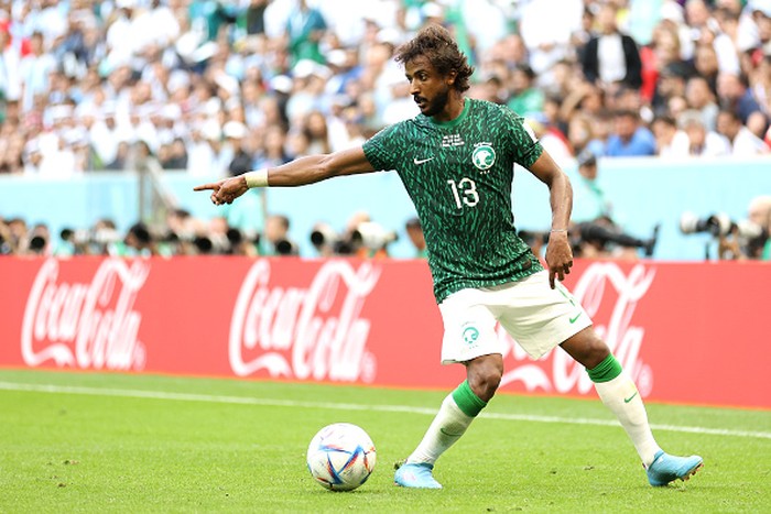 TOPSHOT - Saudi Arabia's goalkeeper #21 Mohammed Al-Owais (R) hits Saudi Arabia's defender #13 Yasser Al-Shahrani (C) in the head during the Qatar 2022 World Cup Group C football match between Argentina and Saudi Arabia at the Lusail Stadium in Lusail, north of Doha on November 22, 2022. (Photo by Kirill KUDRYAVTSEV / AFP) (Photo by KIRILL KUDRYAVTSEV/AFP via Getty Images)