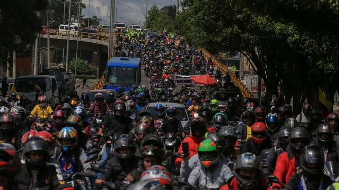 BOGOTA, COLOMBIA - NOVEMBER 23: A group of Motorcyclists gather to protest the rising cost of fuel prices and more options to buy the obligatory third-party insurance in Bogota, Colombia, Wednesday, Nov. 23, 2022. The mobilization of motorcyclists is based on more options to buy the Soat (Obligatory third-party insurance), demands on what they consider to be a persecution by the Police, maintenance of the road network that causes high levels of accidents, among others. (Photo by Juancho Torres/Anadolu Agency via Getty Images)