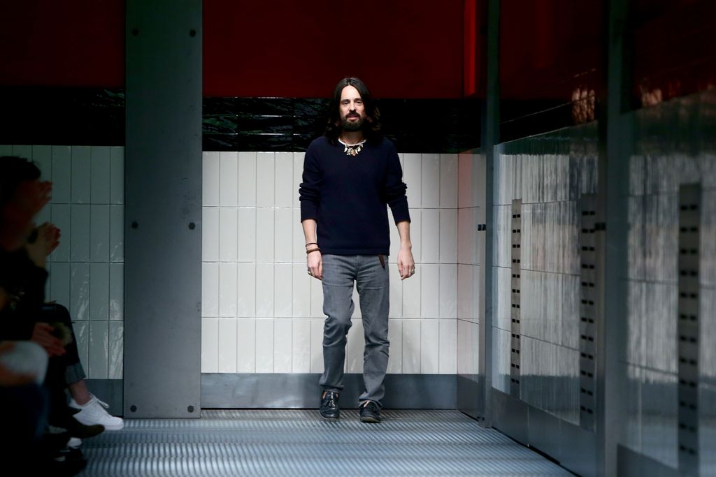 MILAN, ITALY - FEBRUARY 25:  Designer Alessandro Michele acknowledges the applause of the audience after the Gucci show during the Milan Fashion Week Autumn/Winter 2015 on February 25, 2015 in Milan, Italy.  (Photo by Vittorio Zunino Celotto/Getty Images)