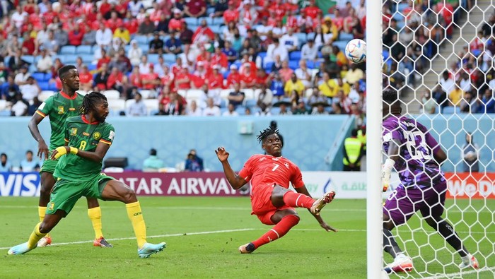 AL WAKRAH, QATAR - NOVEMBER 24: Breel Embolo of Switzerland takes a shot on goal against Andre Onana of Cameroon during the FIFA World Cup Qatar 2022 Group G match between Switzerland and Cameroon at Al Janoub Stadium on November 24, 2022 in Al Wakrah, Qatar. (Photo by Dan Mullan/Getty Images)