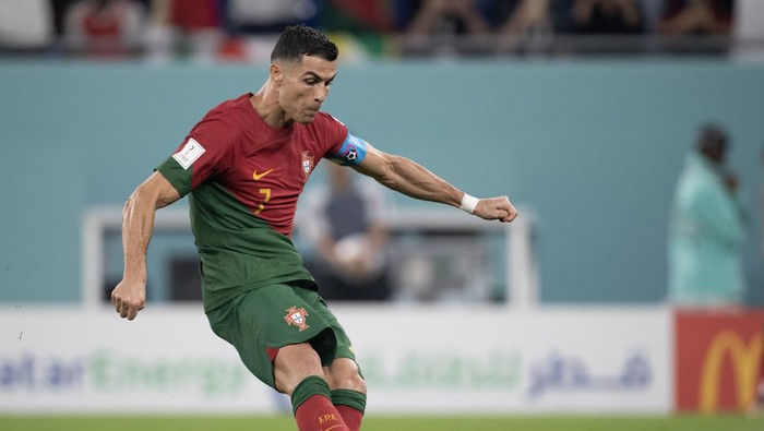 DOHA, QATAR - NOVEMBER 24: Cristiano Ronaldo scores from the penalty spot for Portugal during the FIFA World Cup Qatar 2022 Group H match between Portugal and Ghana at Stadium 974 on November 24, 2022 in Doha, Qatar. (Photo by Visionhaus//Getty Images)