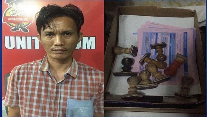 Kepala Desa Purun Timur, AL, yang diduga korupsi dana desa dan barang bukti.