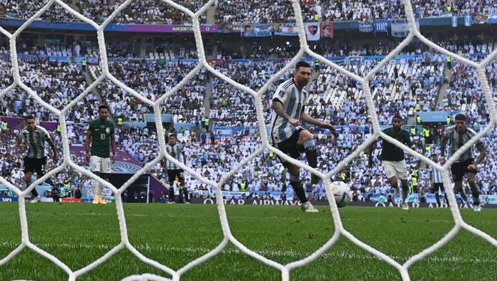 Lionel Messi Argentina's forward #10 Lionel Messi (C) runs up to take a penalty during the Qatar 2022 World Cup Group C football match between Argentina and Saudi Arabia at the Lusail Stadium in Lusail, north of Doha on November 22, 2022. (Photo by Odd ANDERSEN / AFP) (Photo by ODD ANDERSEN/AFP via Getty Images)